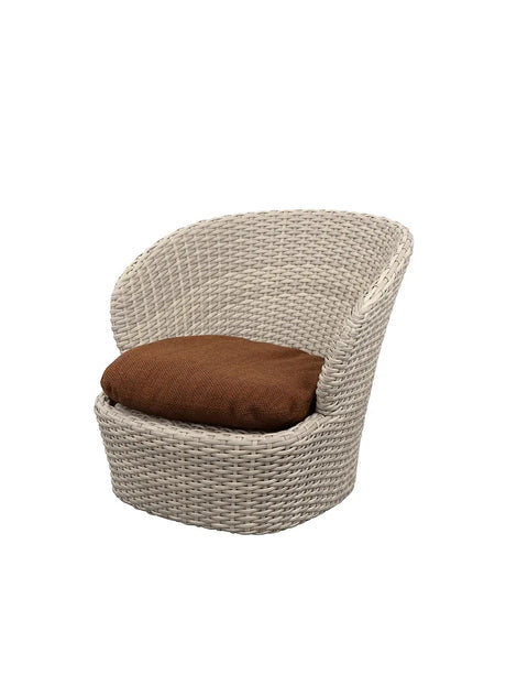 Coast Loungestol med. Swivel, sand fra Cane-line - Umber Brown, Cane-line Rise - Jacobsen Plus