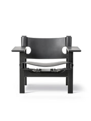 Den Spanske Stol i sort læder, eg sort lak af Børge Mogensen