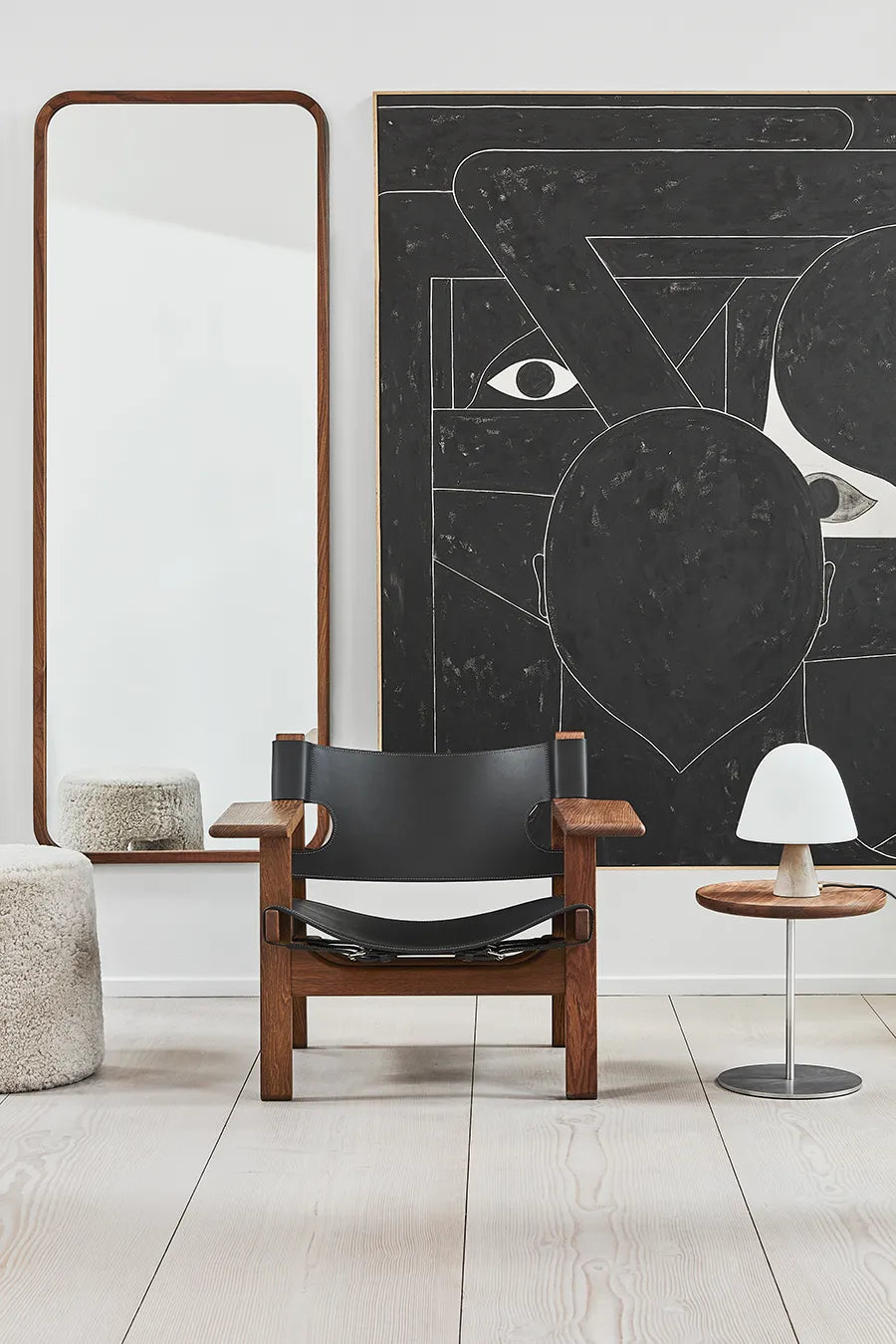 Den Spanske Stol i sort læder, valnød olie af Børge Mogensen