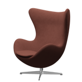 Ægget, Christianshavn stof, drejelig inkl. skammel af Arne Jacobsen - Orange 1133 - Jacobsen Plus