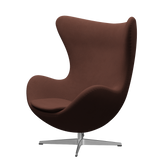 Ægget, Christianshavn stof, drejelig inkl. skammel af Arne Jacobsen - Mørk orange 1134 - Jacobsen Plus