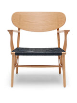 CH22 Loungestol af Hans J. Wegner - Sort / Eg - oliebehandlet - Jacobsen Plus