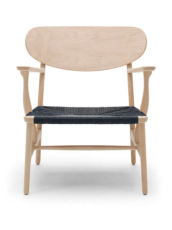 CH22 Loungestol af Hans J. Wegner - Sort / Eg - sæbebehandlet - Jacobsen Plus
