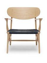 CH22 Loungestol af Hans J. Wegner - Sort / Eg - hvidolieret - Jacobsen Plus